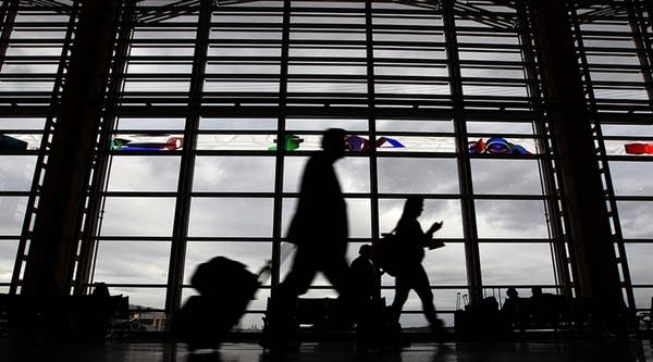 Americans spent almost $3 billion on insurance in 2016, up 19 percent from two years earlier, the US Travel Insurance Association says. Above, travelers make their way to flights at Ronald Reagan Washington National Airport.