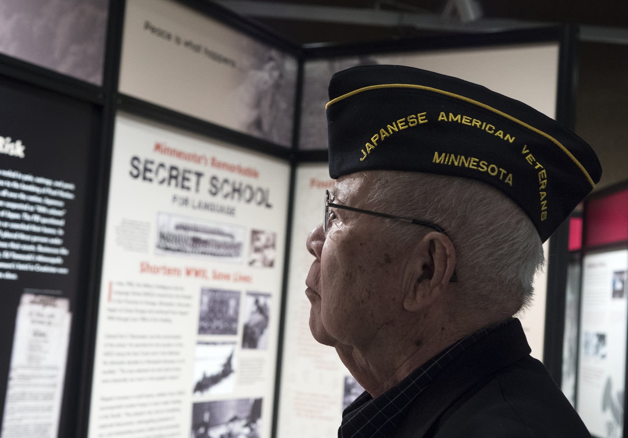 Edwin 'Bud' Nakasone of St. Paul reads a display.