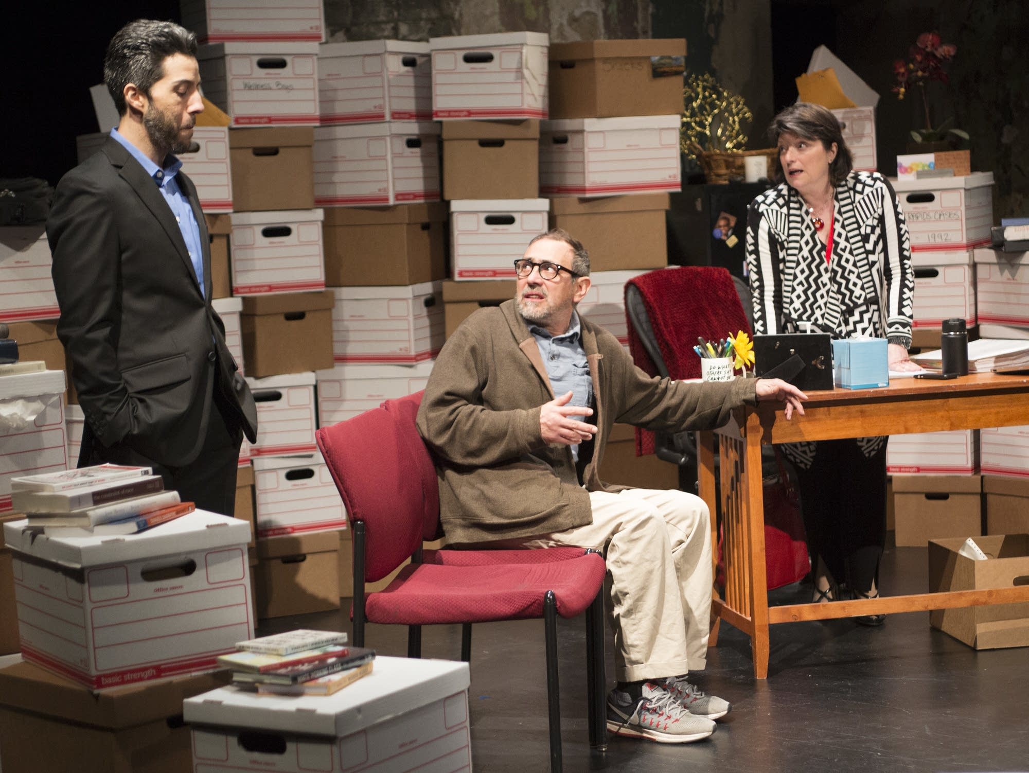 James Rodriguez, Dario Tanglelson and Jodi Kellog rehearse a scene.