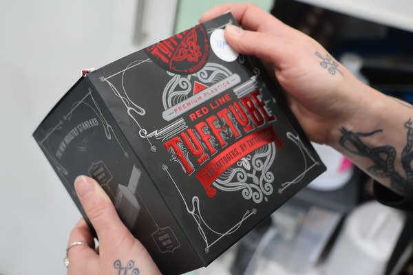 A person holding a box