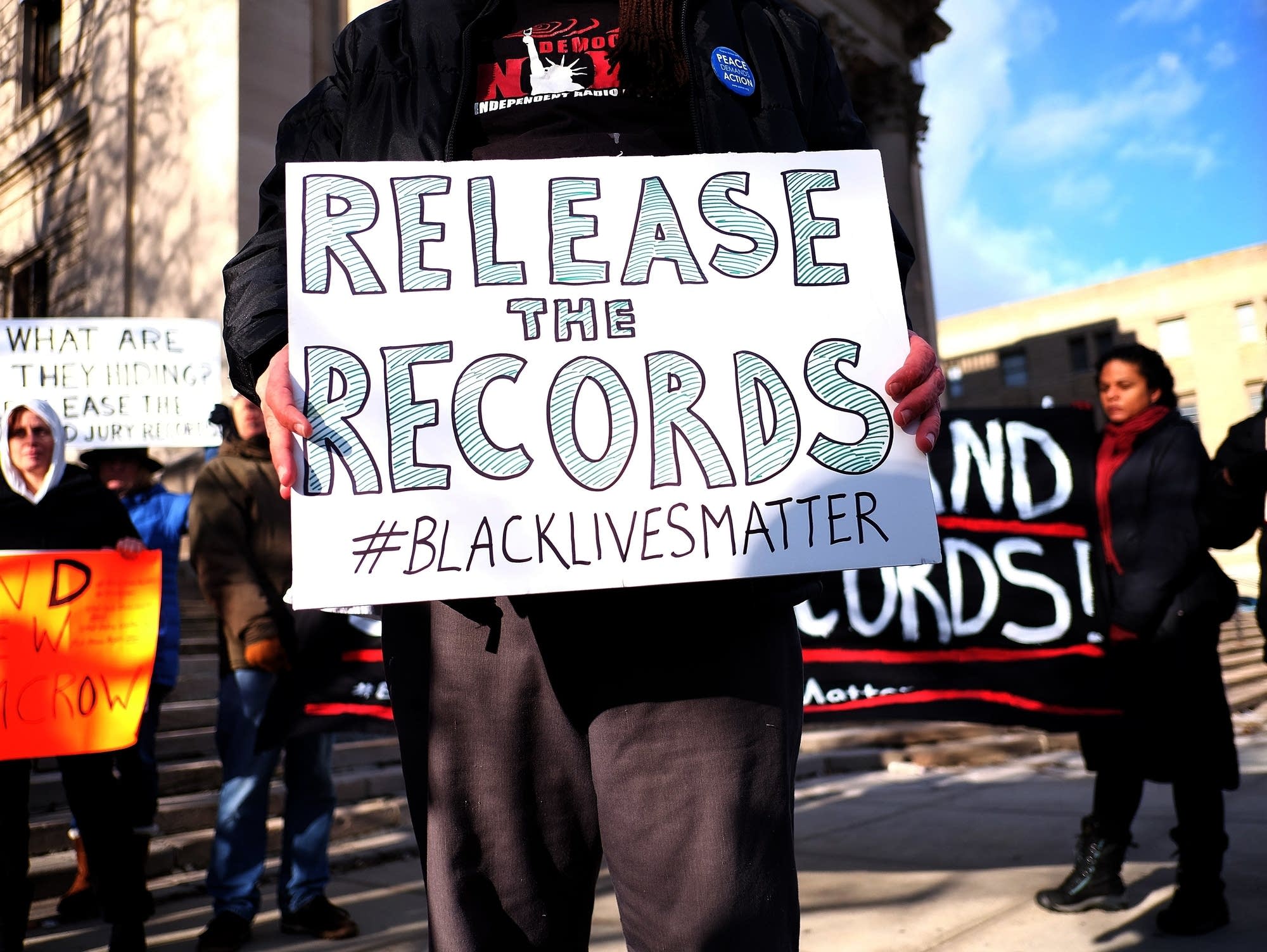 Demonstrators outside a Staten Island courthouse