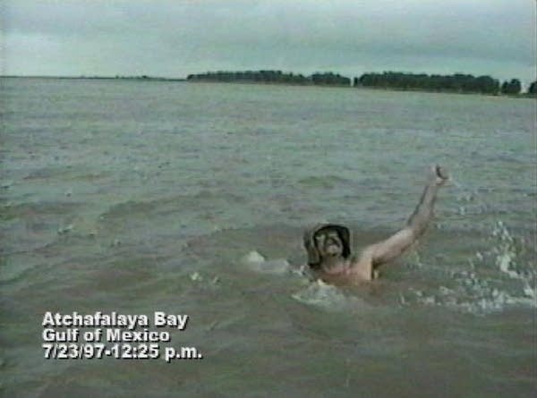 Winona artist says he was first to swim Mississippi