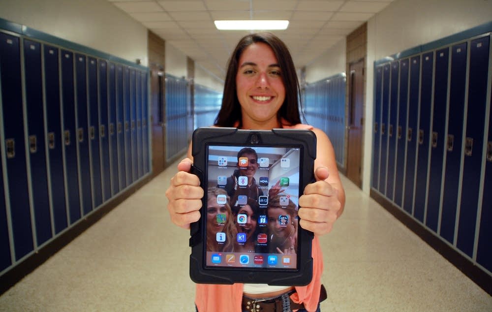 Andrea Howard has a district-provided iPad.