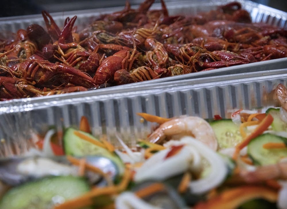 Through grief, Hmong families torn between honoring the dead, keeping