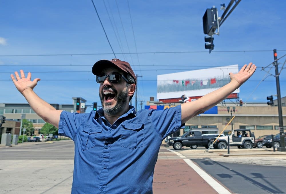 Alec Soth celebrates unveiling of his billboard.