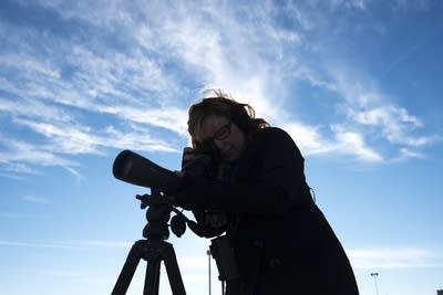 Sharon Stiteler uses a spotting scope.