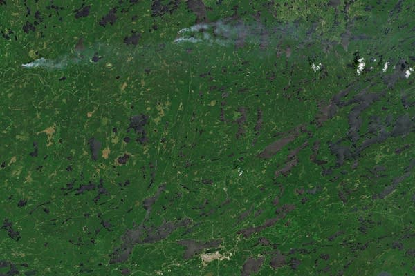 Satellite images of wildfires in northern Minnesota and Ontario