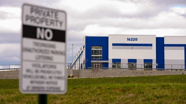 Above, an exterior view of a warehouse that is the site for a planned ICE detention center in Williamsport, Maryland.