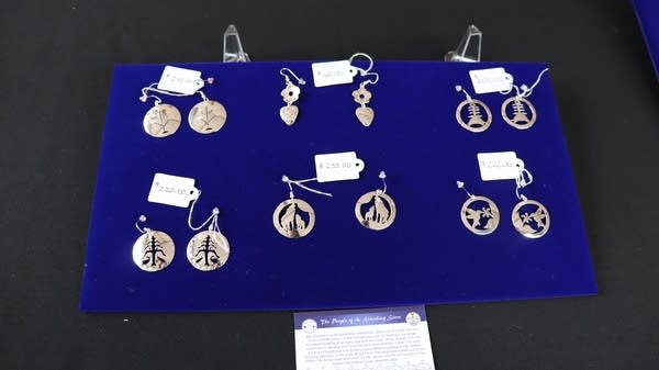 Silver earrings.