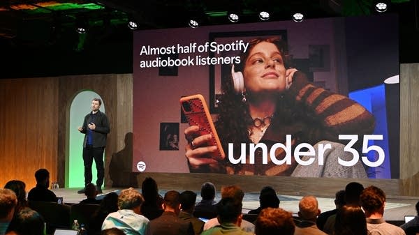 Above, Owen Smith, head of audiobooks at Spotify, speaks during Spotify’s Investor Day last week.