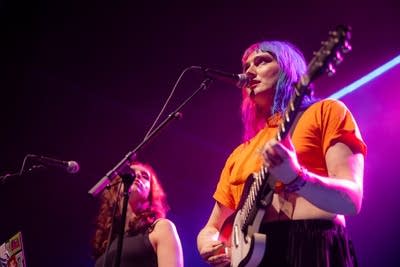 Two people performing on stage