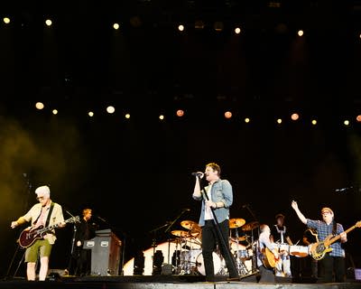 the band matchbox twenty performing at an outdoor music festival at night