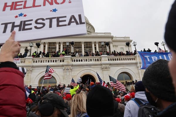 Trump supporters gather outside the U.S. Capitol building.