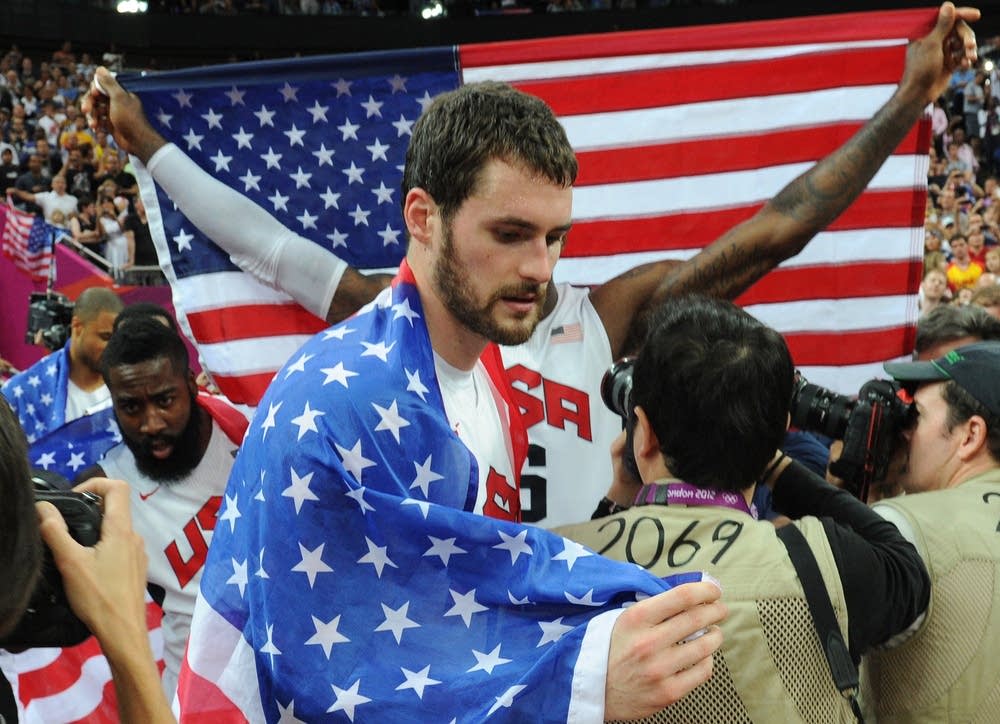 US forward Kevin Love celebrates after w