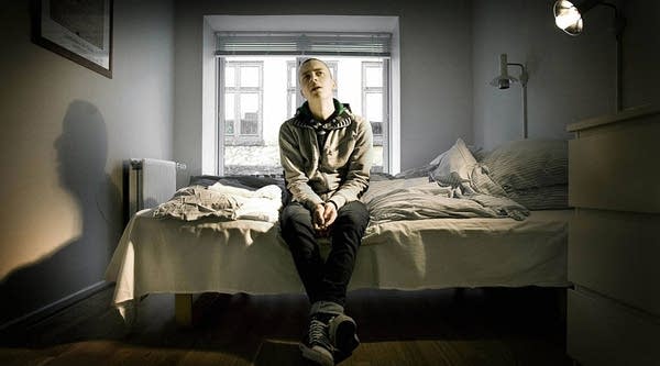 Joachim, 19, who works in the 'Hotellet,' sits in a room of the hotel in Copenhagen, 09 January 2007.