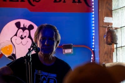 Jim walsh peforming on stage