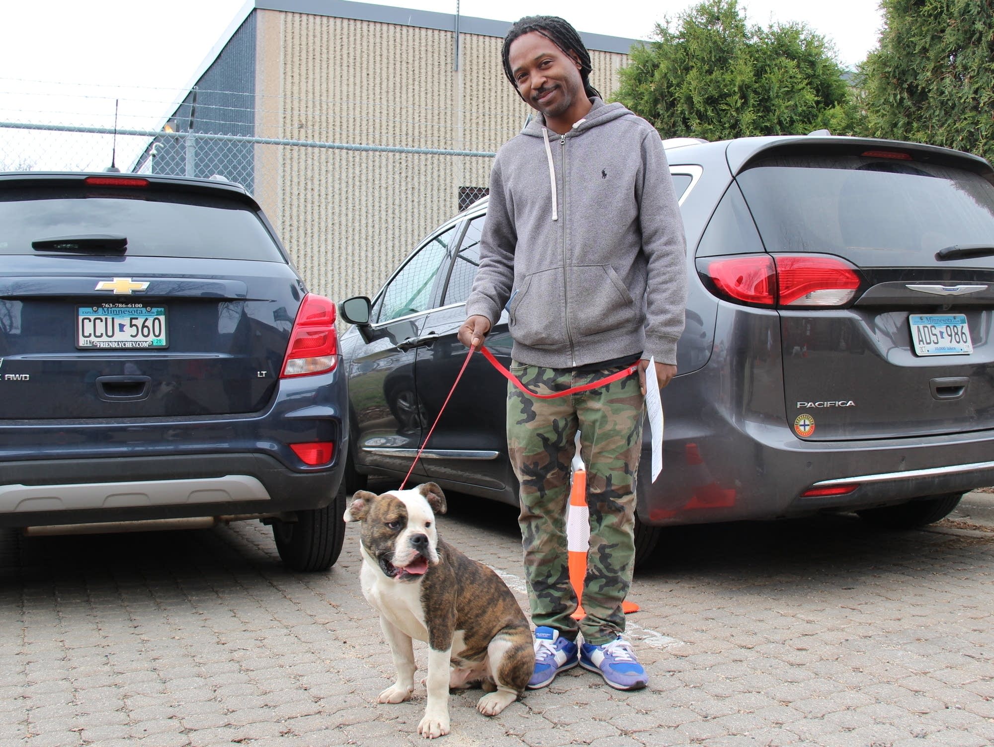 Ausar Lovestar and his Olde English bulldog, Horace.