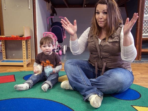 Amanda Theisen, owner of the Little Ducks Daycare, sings 'The Tiny Turtle.'