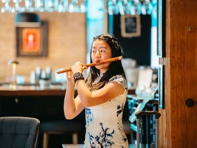 Ammy Lin plays the dizi.