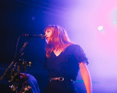 she's green performing on stage