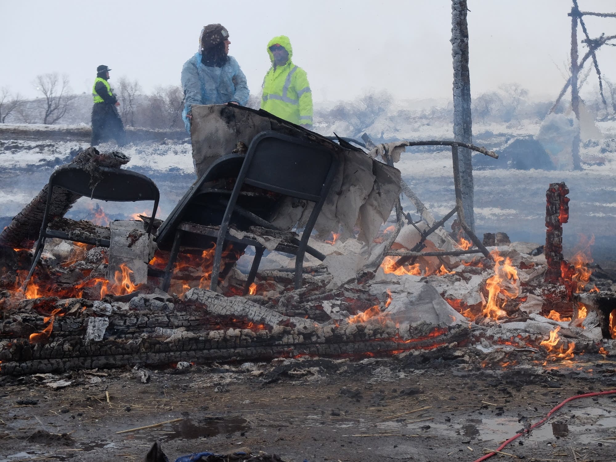 A building burns at the Oceti Sakowin camp
