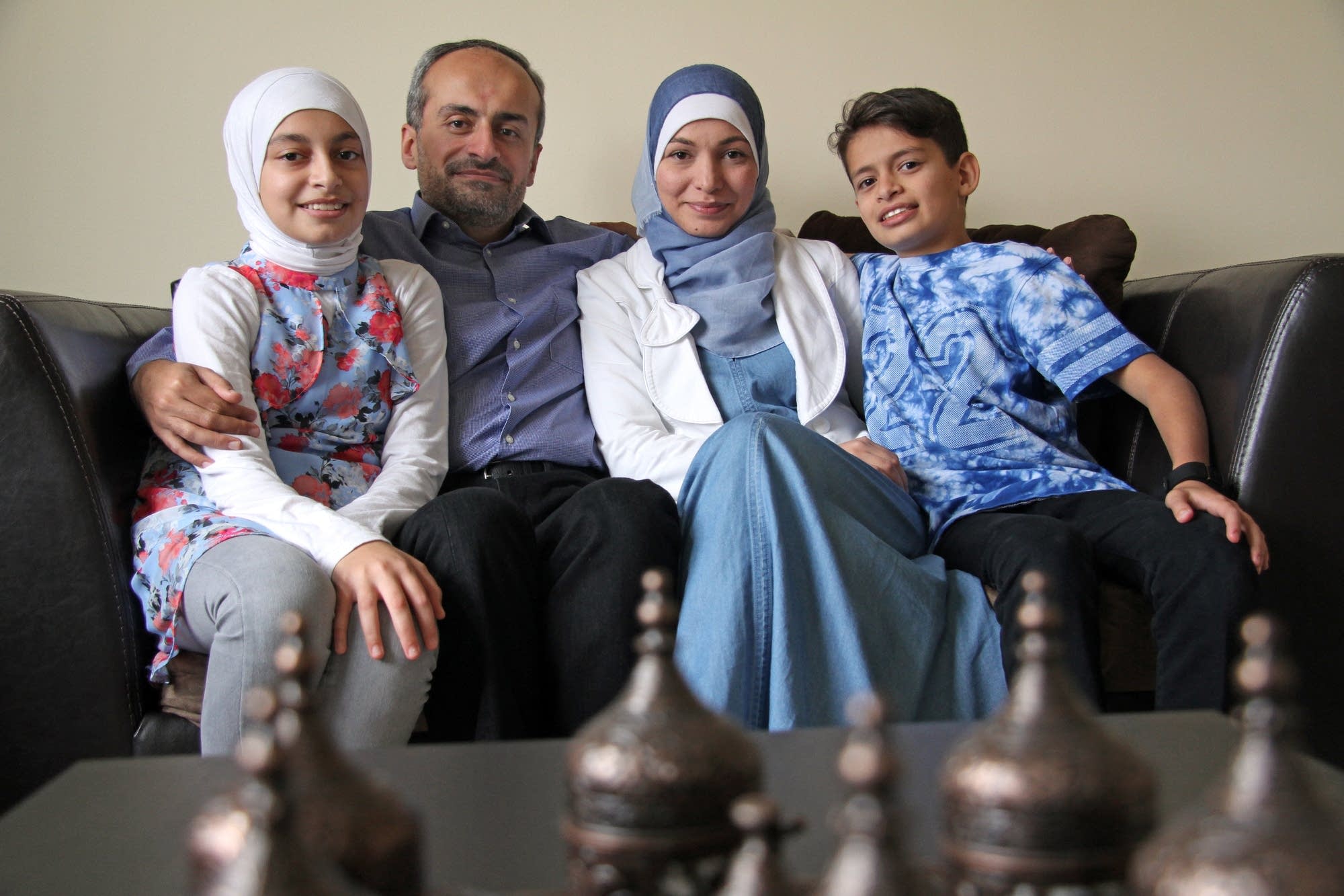 Aya, 13, Shadi Anis, Ranim Alchaar, and Abdullah, 11, feel welcome.