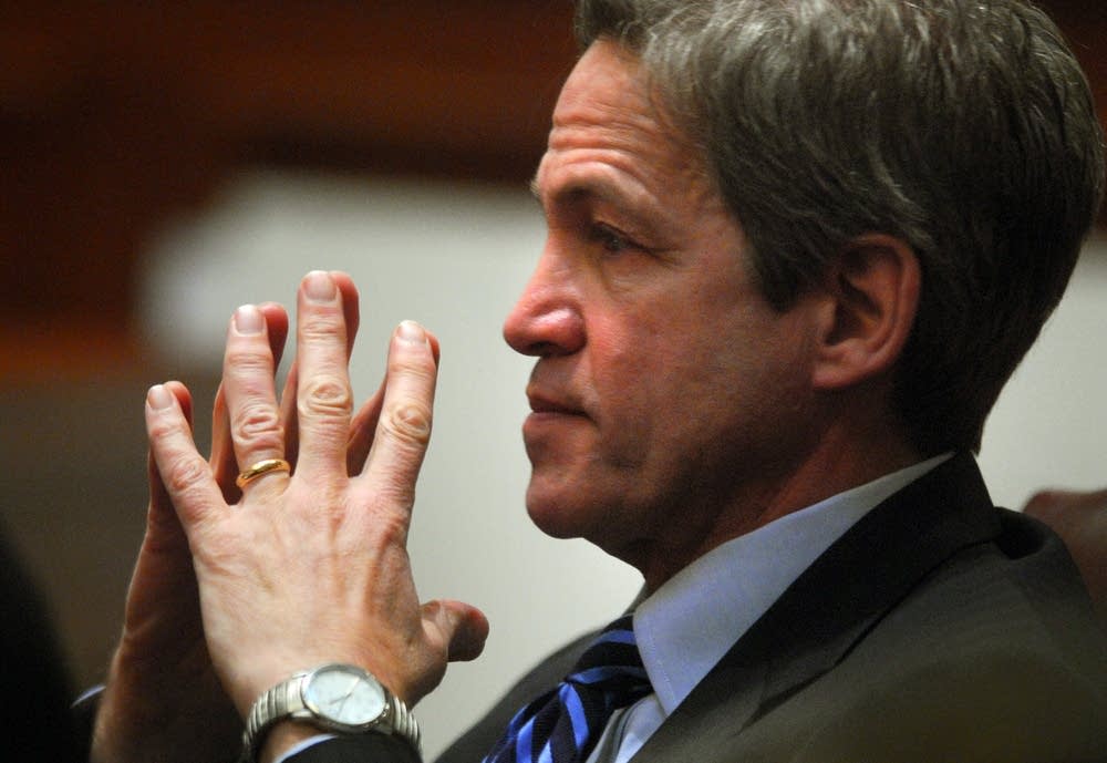 Coleman listens to a witness