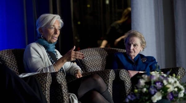 Christine Lagarde (L), head of the IMF, appears on a panel at Wellesley College with former Secretary of State Madeleine Albright (R)
