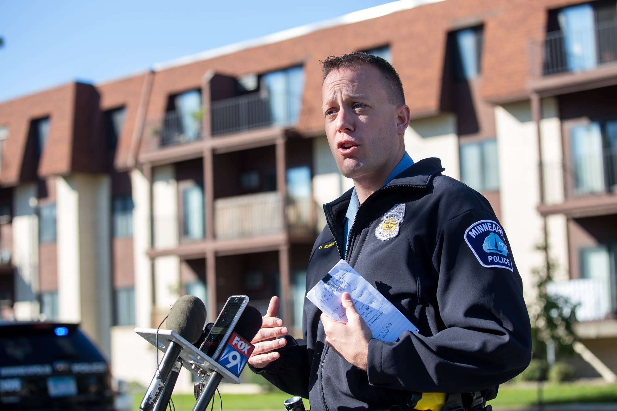 PIO Corey Schmidt talks to the media.