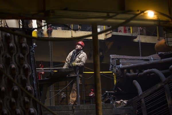 A worker inside the Herbert C. Jackson