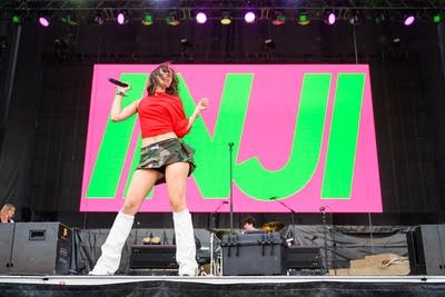 INJI performing on stage