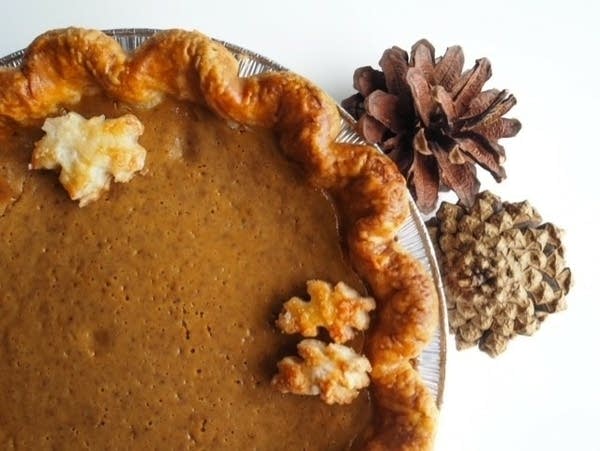 pumpkin pie with pinecones