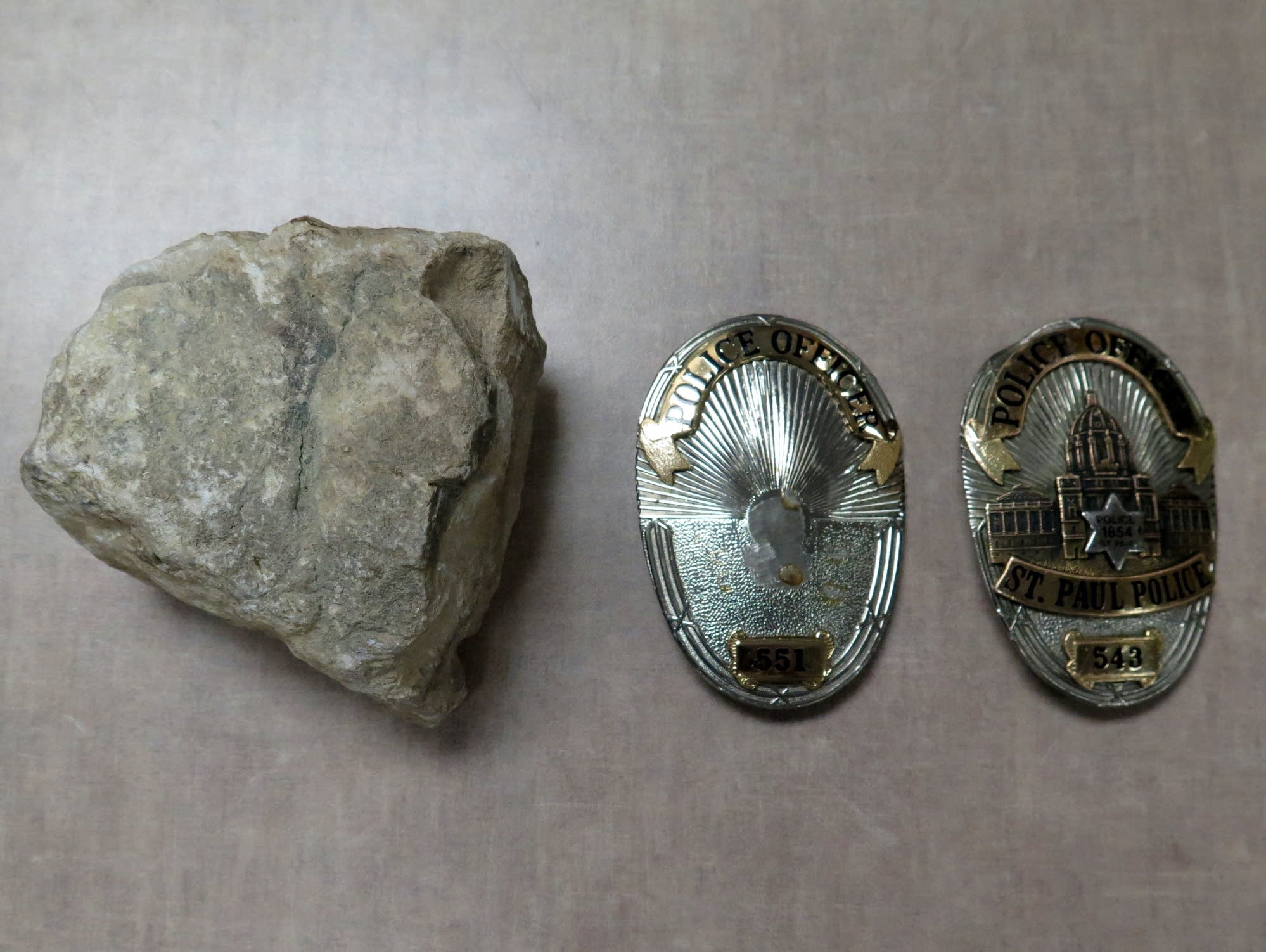 A damaged police badge