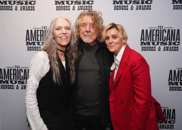 (L-R) Gillian Welch, Robert Plant and Brandi Carlile pose backstage during the 25th Annual Americana Honors & Awards at Ryman Auditorium on September 16, 2026 in Nashville, Tennessee.