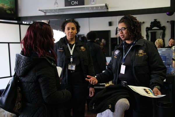 Rae Brown, right, and Tanisha Morgan chat with Khulia Pringle.