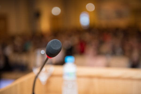 Photo of podium mic from POV of speaker at podium