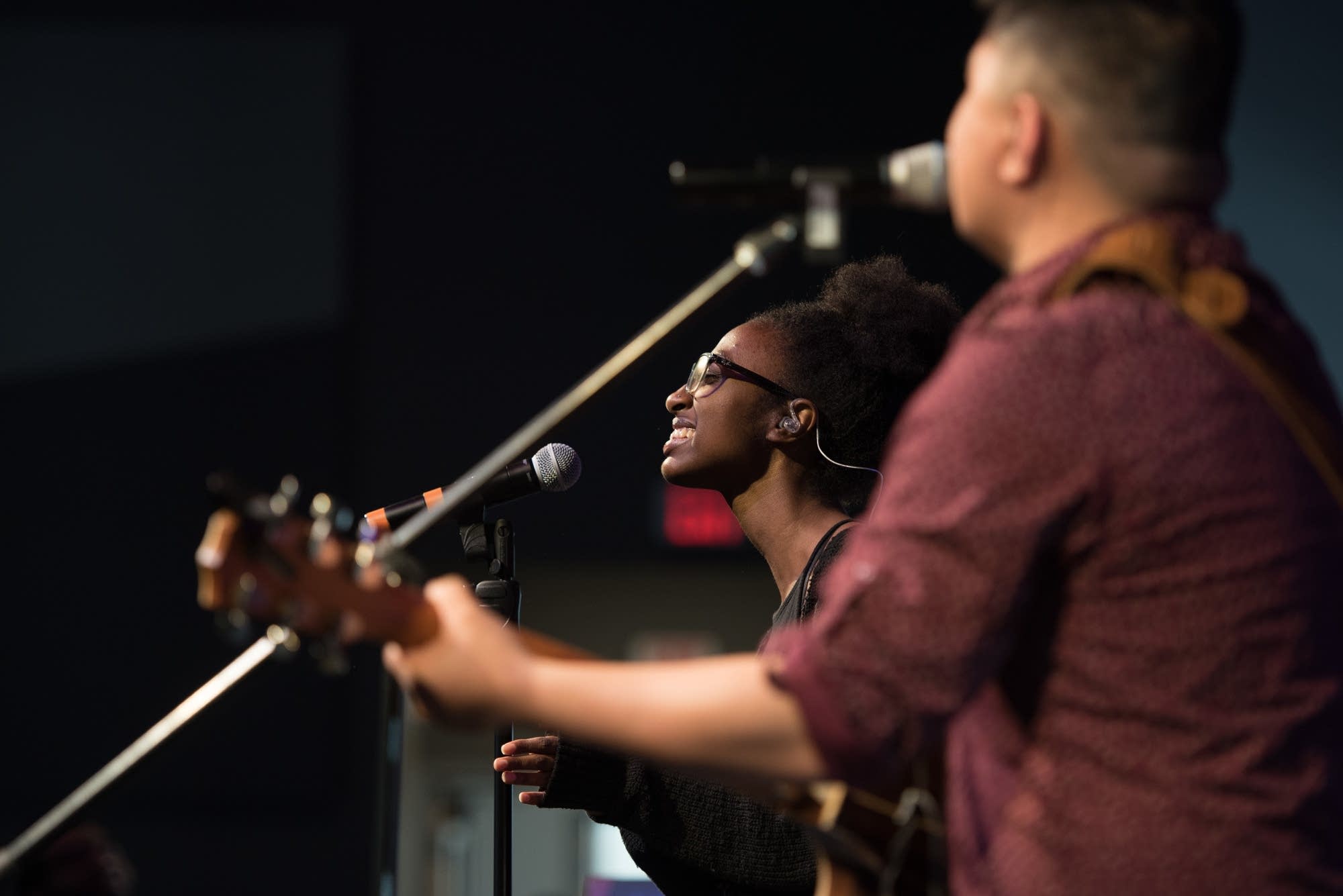 Aantuu Mengitsu, left, sings with the worship band from Crown College.