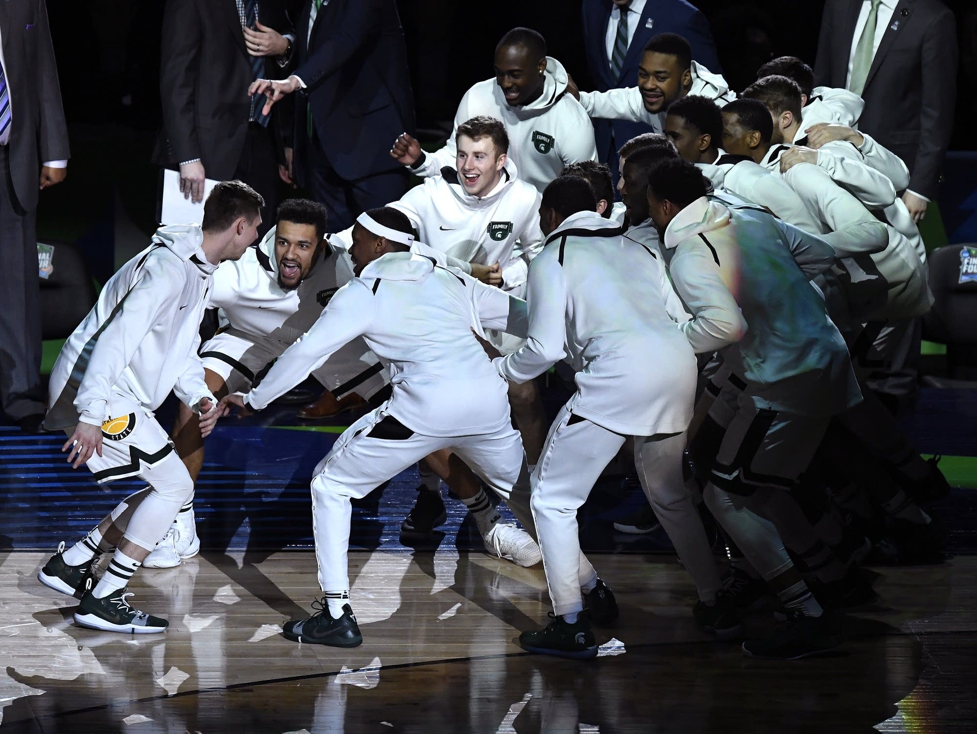 Michigan State players huddle