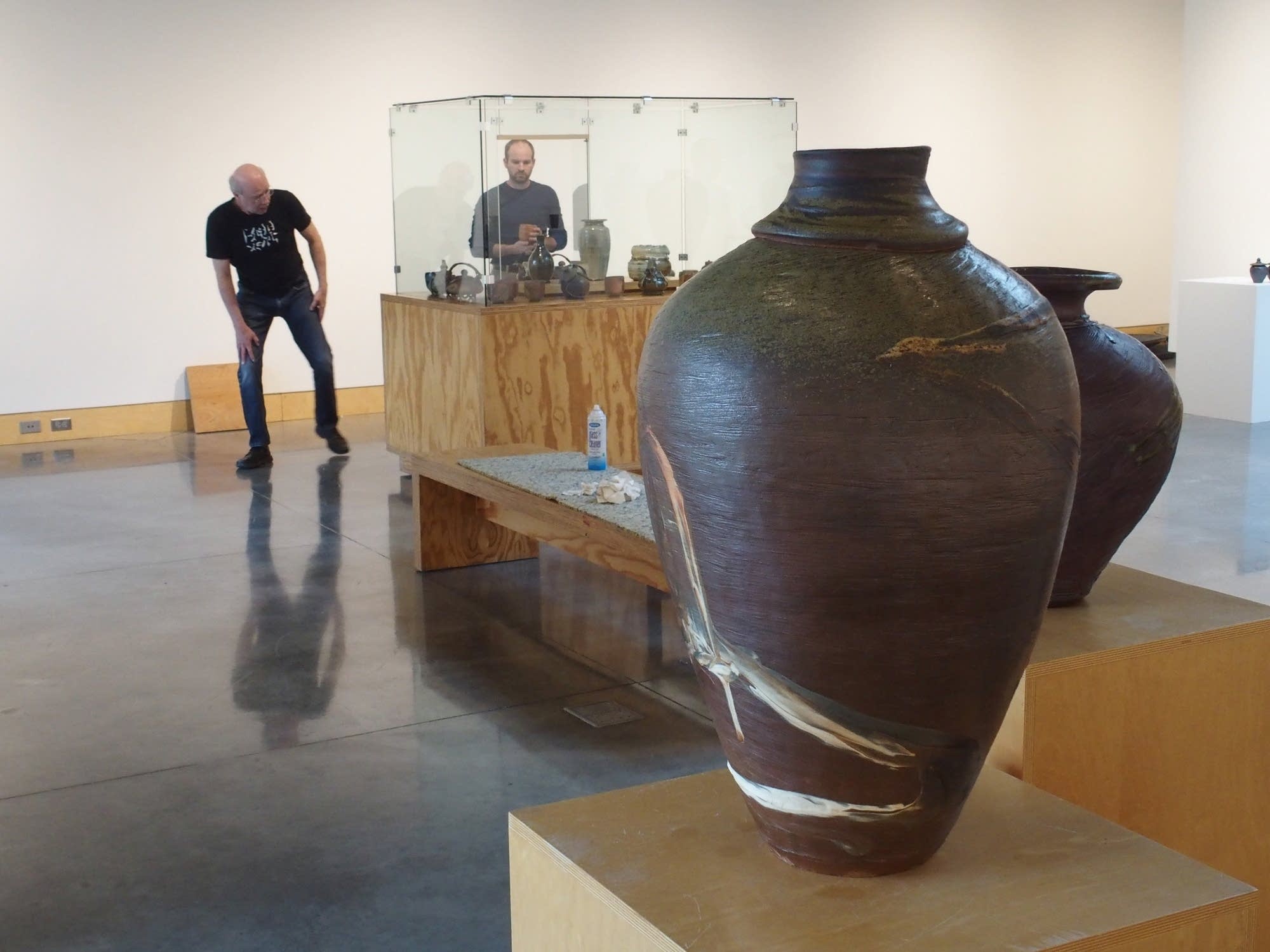 Richard Bresnahan guides an assistant
