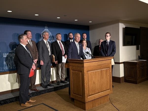 Michael Kreun speaking at podium