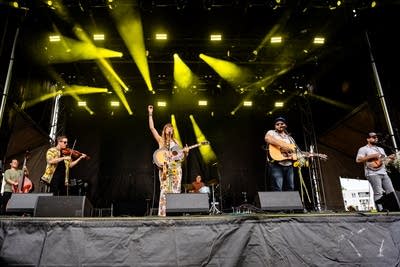 Maygen & the Birdwatcher performing on stage