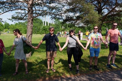 People hold hands 