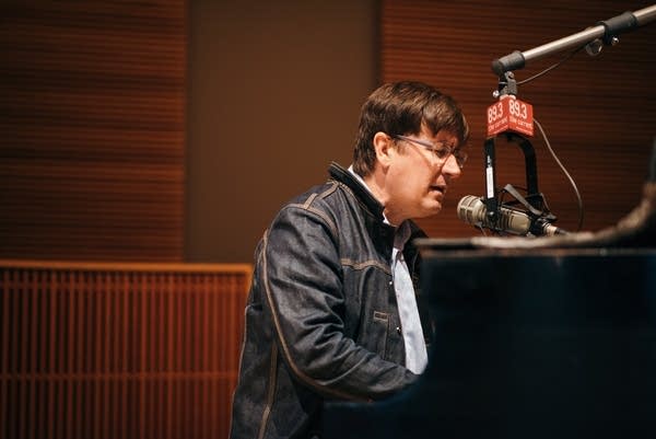 John Darnielle of Mountain Goats playing piano in The Current studio
