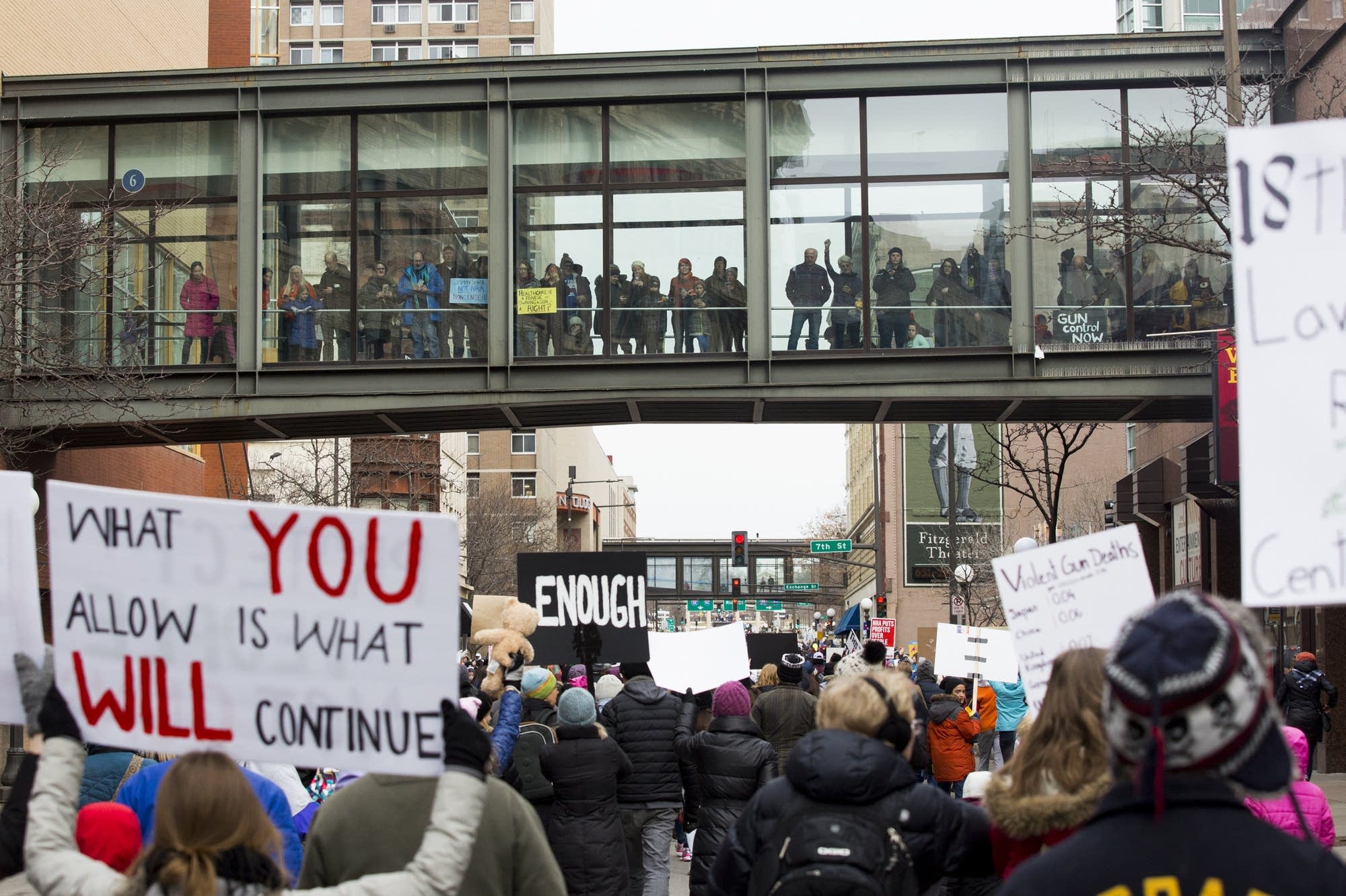 Marchers head down Wabasha Street toward the State Capitol.