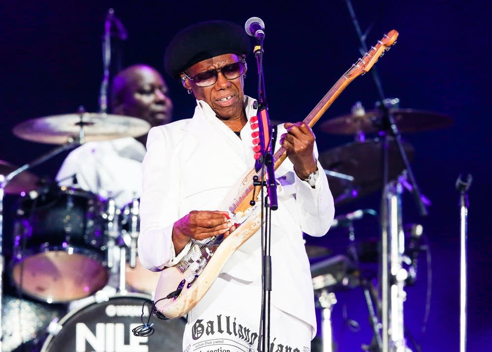 Nile Rodgers performing onstage