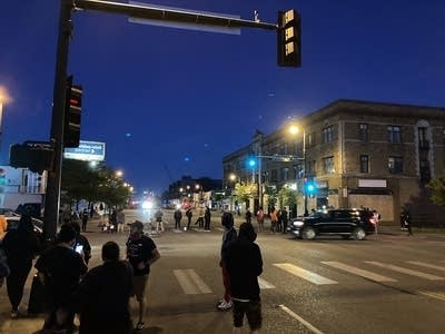 Small crowd Lake and Pillsbury looking toward the precinct