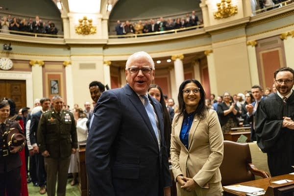 people at a capitol event with Walz