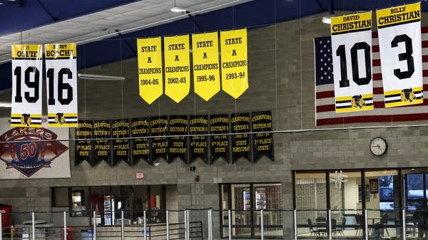 Championship banners hang alongside the retired numbers