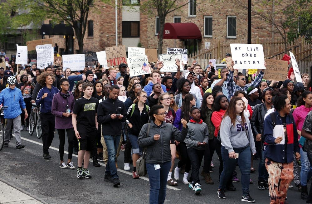 Students march along Nicollet Avenue