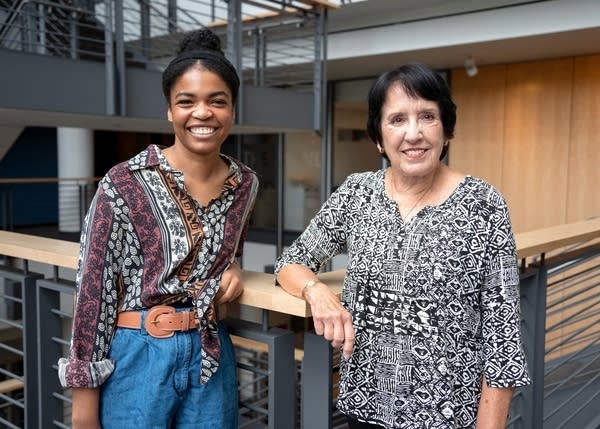 two women posing for a portrait